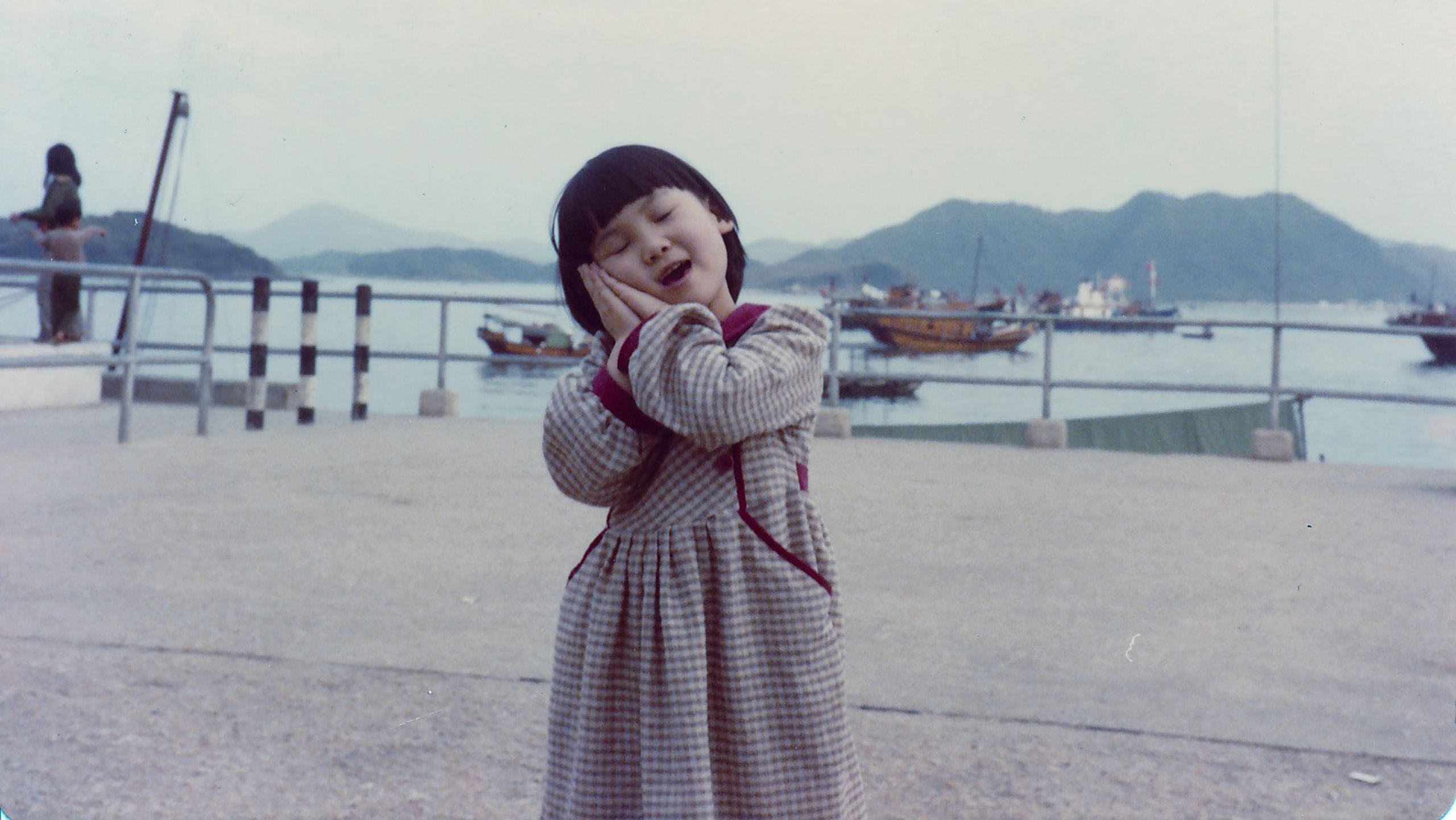 Jessica grew up in a small fishing village in Hong Kong.