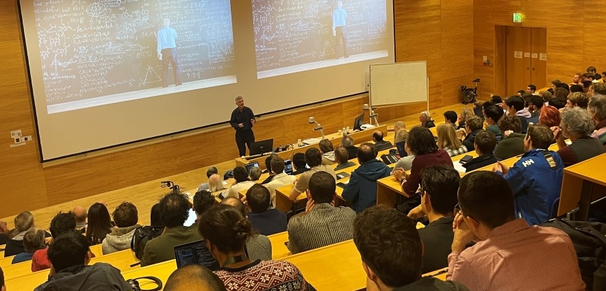 Simon Peyton Jones delivering the 2023 Wheeler Lecture