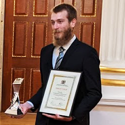 Student Jonas Fiala receives his award at the Mansion House